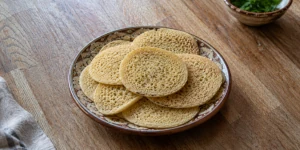 Traditional Moroccan Baghrir semolina pancakes with hundreds of small holes