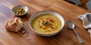 Traditional Moroccan Bissara with olive oil, cumin and paprika