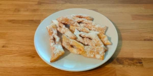 Authentic Polish Faworki - homemade crispy fried pastry dusted with powdered sugar