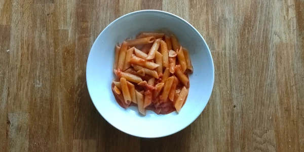 Penne all’arrabbiata, classic Italian pasta with spicy tomato sauce, garlic and chili