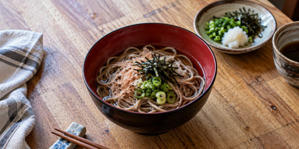 Traditional Wanko Soba from Iwate, Japan: small servings of buckwheat noodles with classic condiments.